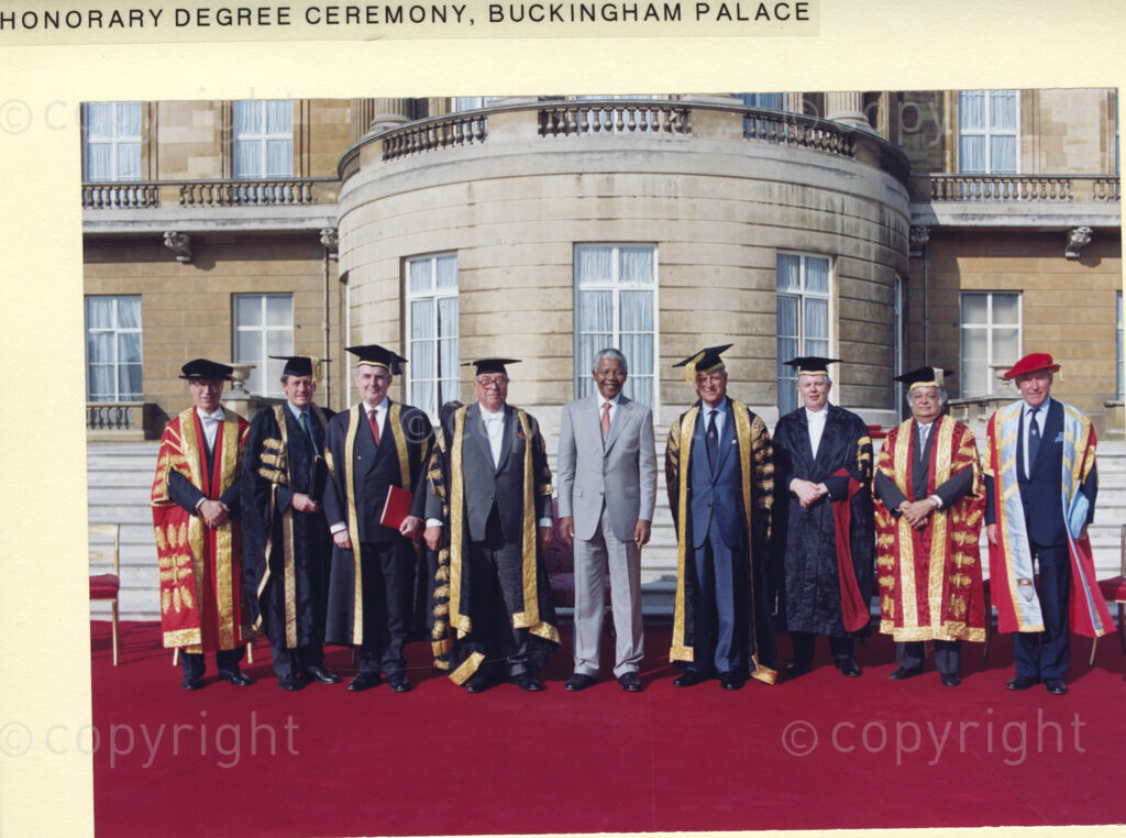 Buckingham Palace, London, United Kingdom, 19960701. PHOTO: ANC Archives: President Nelson Mandela is on a state visit to the United Kingdom in July 1996. At a ceremony in the gardens of Buckingham Palace, eight United Kingdom universities conferred honarary degrees on Mandela. He is seen here with the dignitaries who take part in the award ceremony.