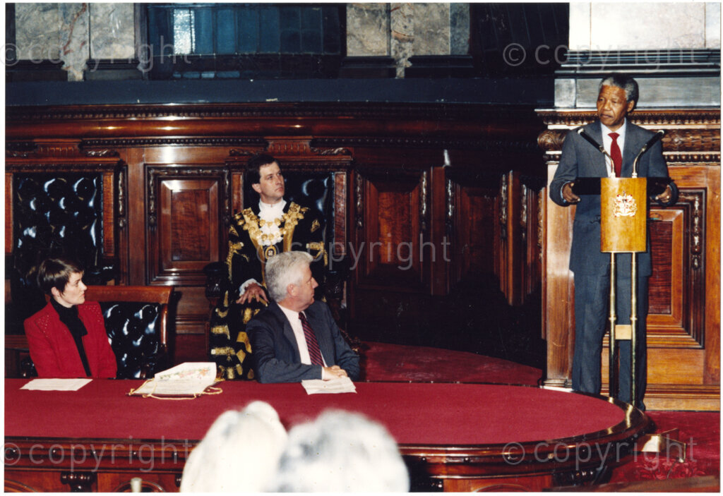 Australia, October 1990. PHOTO: ANC Archives: During his 1990 visit to Australia, Nelson Mandela, Deputy President of the African National Congress, addresses an assembly of people who appear to be academics or politicians. 
No further information is available. Monday 22 October to Saturday 27 October 1990.