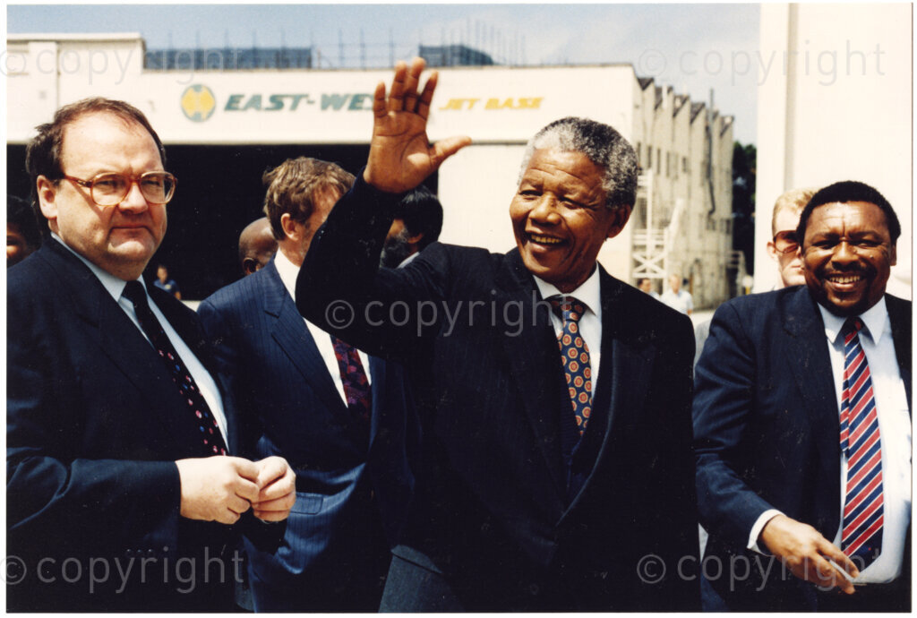 Australia, October 1990. PHOTO: ANC Archives: In 1990, Nelson Mandela,(centre), Deputy President of the African National Congress, is jubilant to be a free man after 27 years in prison. He is also happy to be in Australia for the first time. He is grateful for the economic and political activism from this country. It brought pressure to bear on the South African apartheid regime and was a contributory factor in expediting Mandela's release. Monday 22 October to Saturday 27 October 1990.