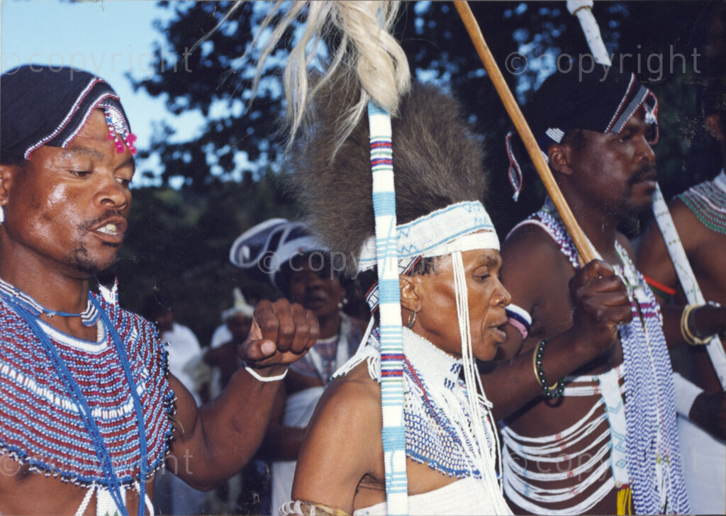 Cape Town, Western Cape, South Africa, 19970418. PHOTO: ANC Archives.

A group of Xhosa men from the Eastern Cape dressed in traditional attire, their outfits and beadwork predominantly blue and white, and some bearing knobkerries, perform at the inauguration of the Council of Traditional Leaders in Cape Town, Western Cape, South Africa on 18 April 1997.