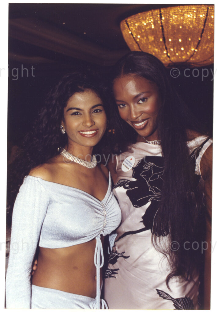 Table Bay Hotel, Cape Town, Western Cape, Republic of South Africa, 19970927. PHOTO: ANC Archives.

Miss South Africa, Kerishnie Naicker (left) and supermodel Naomi Campbell enjoy the gala evening at the Table Bay Hotel, Cape Town, on 27 September 1997 after travelling on the relaunched luxury Blue Train from Pretoria to Cape Town.