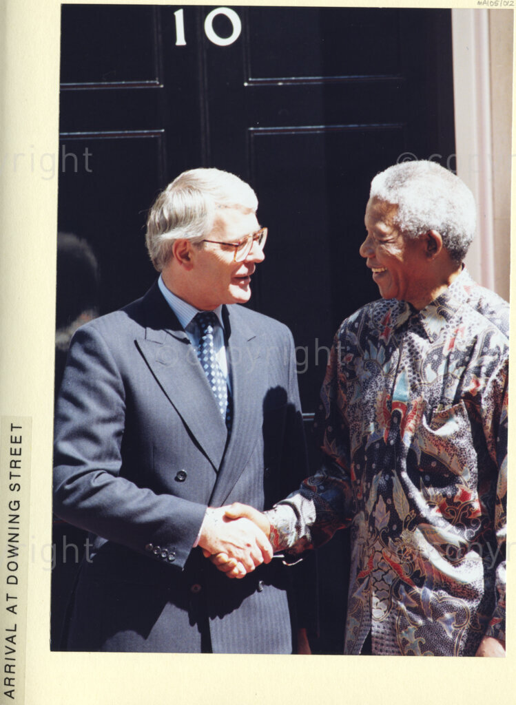 10 Downing Street, London, United Kingdom, 19960701. PHOTO: ANC Archives: South African President Nelson Mandela, (right), is greeted on his state visit to the United Kingdom, in July 1996, by Prime Minister John Major. They are standing outside 10 Downing Street in London.
