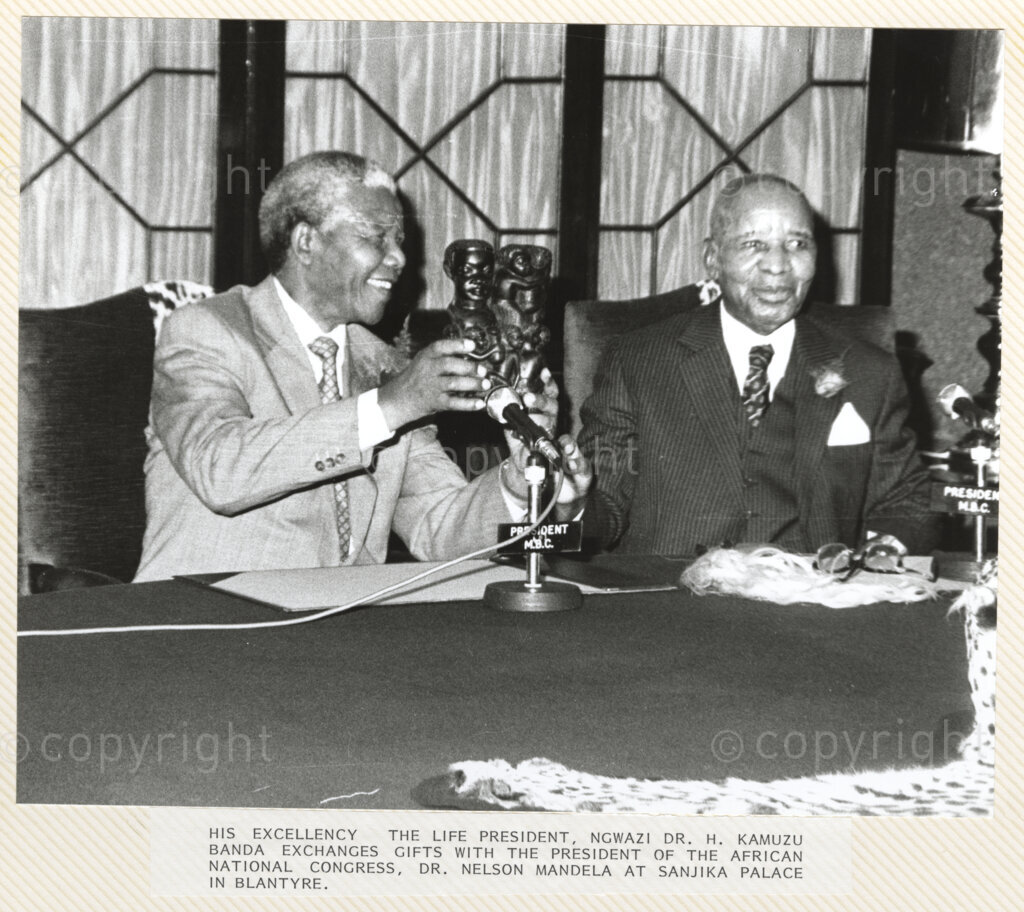 Sanjika Palace, Blantyre , Blantyre District, Malawi. PHOTO: ANC Archives.

President of the African National Congress, Nelson Mandela (left) receives two sculptures as gifts from His Excellency the Life President of the Republic of Malawi, Ngwazi Dr Hastings Kamuzu Banda (his official title) (right) at the Sanjika Palace in Blantyre, during Mandela's visit to Malawi on 17 June 1992.