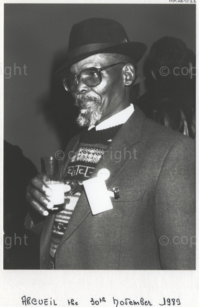 Arcueil, Val-de-Marne, Paris, Île-de-France, France, 19891130. PHOTO: ANC Archives: African National Congress (ANC) comrades living in exile and members of various French anti-apartheid movements gather in Arcueil, France on 30 November 1989 for the unveiling of a commemorative plaque for Dulcie September. Dulcie September, a South African anti-apartheid activist and ANC Chief Representative in France, Switzerland and Luxembourg, was assassinated outside the ANC's Paris office at 28 Rue des Petites-Ecuries last year on 29 March 1988.
