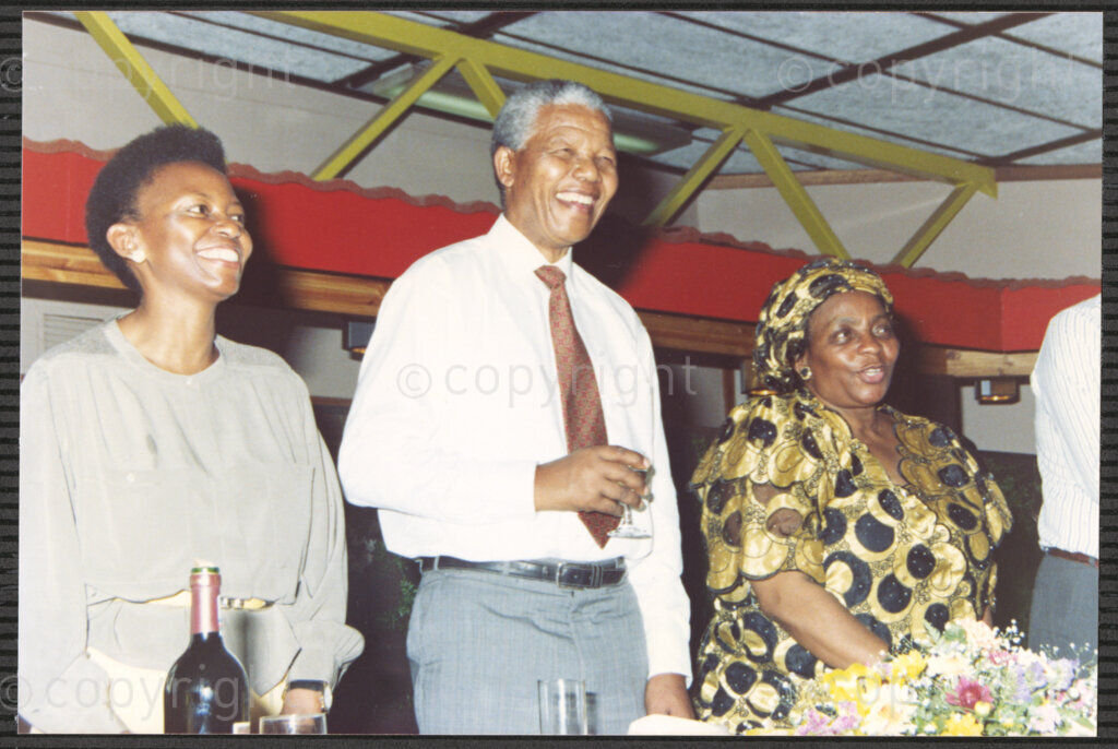 Turfloop Campus, University of the North, Mankweng, Northern Transvaal, South Africa, 19920426. PHOTO: ANC Archives.

Nelson Mandela (centre), the president of the African National Congress (ANC), stands between two women at a celebratory function upon his installation as the chancellor of the University of the North (now the University of Limpopo), 25-26 April 1992, Turfloop Campus, University of the North, Mankweng, Northern Transvaal (now Limpopo), South Africa.