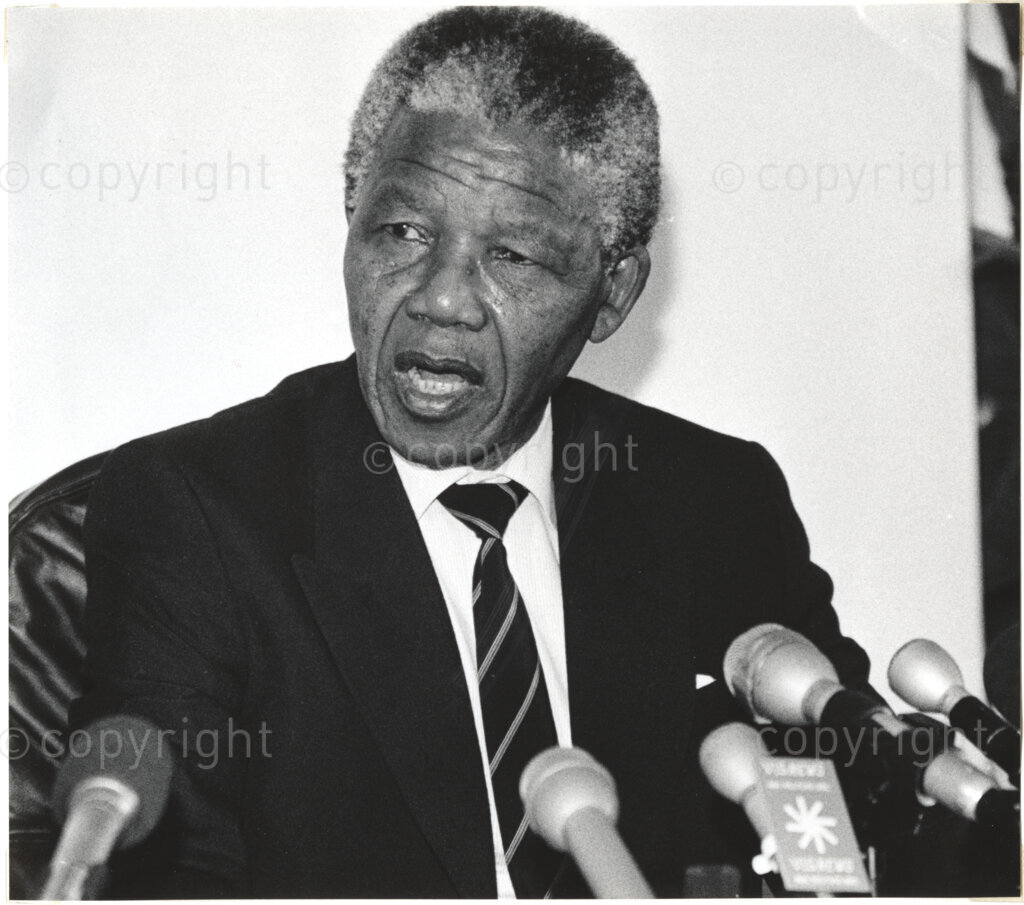 In the limelight Mr Mandela at a press conference.