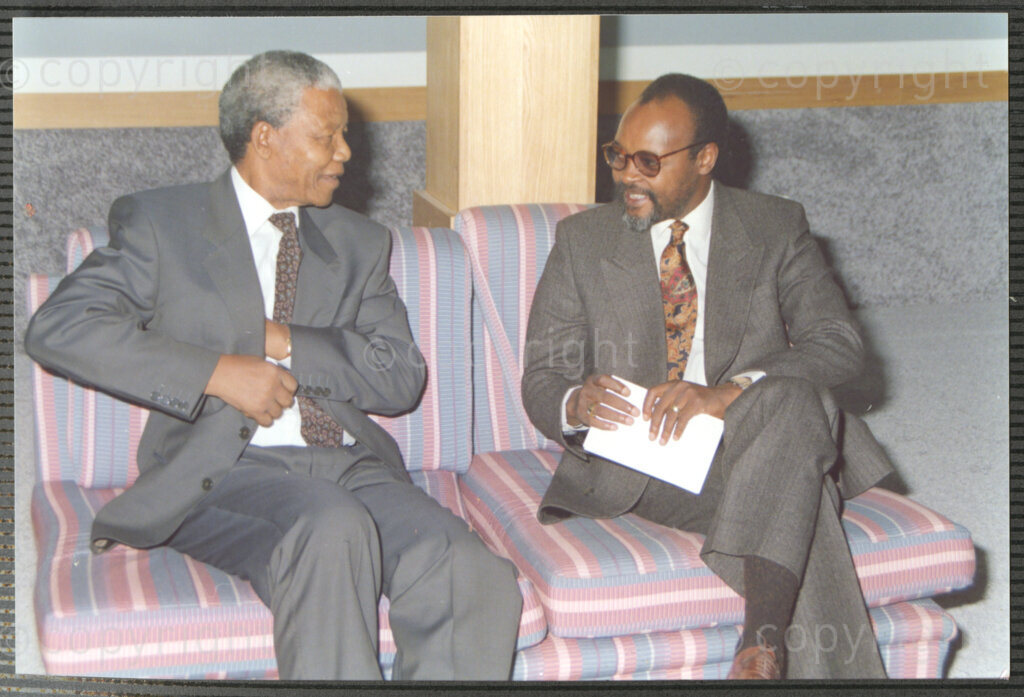 Turfloop Campus, University of the North, Mankweng, Northern Transvaal, South Africa, 19920424. PHOTO: ANC Archives.

Nelson Mandela, the president of the African National Congress (ANC) (left), sits beside Professor Noel Chabani Manganyi (right) at a celebratory function on 24 April 1992, the day before their installation as chancellor and vice chancellor of the University of the North respectively, Turfloop Campus, University of the North (now the University of Limpopo), Mankweng, Northern Transvaal (now Limpopo), South Africa.