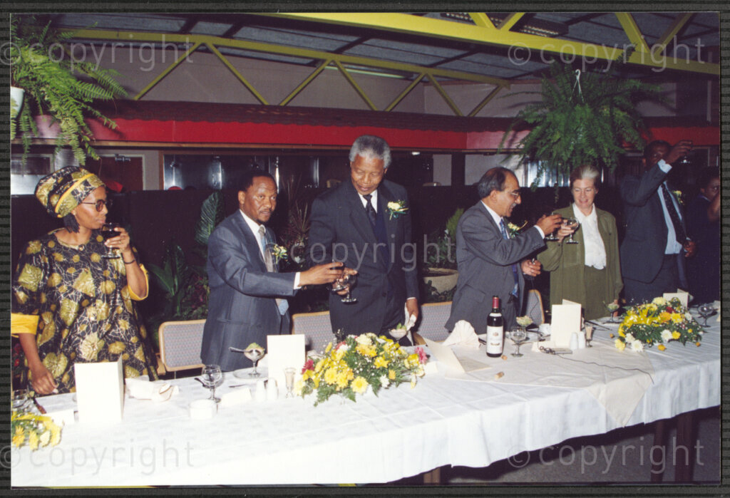 Turfloop Campus, University of the North, Mankweng, Northern Transvaal, South Africa, 19920425. PHOTO: ANC Archives.

Nelson Mandela, the president of the African National Congress (ANC) (third left), and Kader Asmal, a member of the council of the University of the North, at a celebratory function with other university members on the day of Mandela's installation as chancellor of the University of the North (now the University of Limpopo), Turfloop Campus, Mankweng, Northern Transvaal (now Limpopo), South Africa, 25 April 1992.