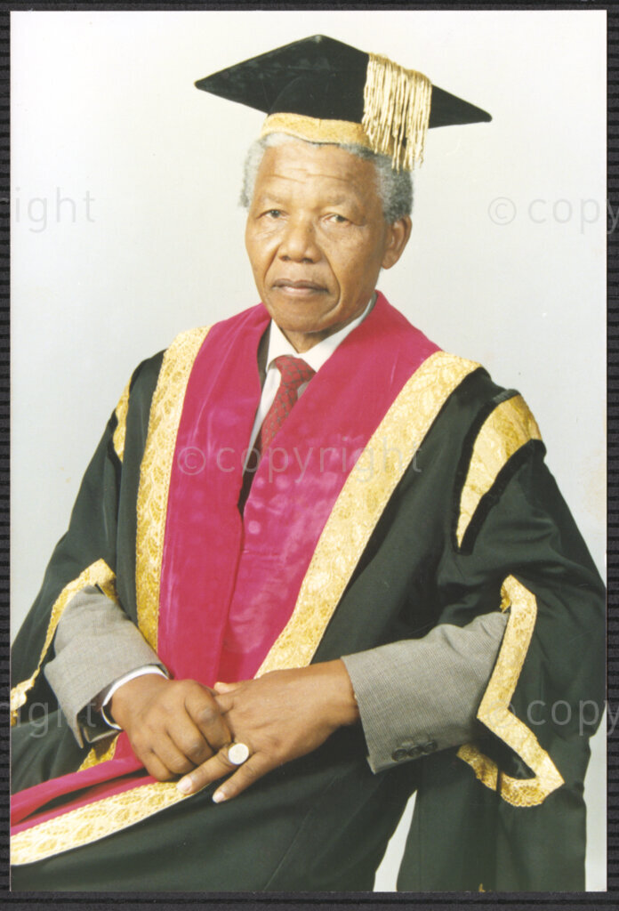 Turfloop Campus, University of the North, Mankweng, Northern Transvaal, South Africa, 19920425. PHOTO: ANC Archives.

A formal photographic portrait of Nelson Mandela, the president of the African National Council (ANC), wearing full academic regalia on the occasion that sees him and Professor Noel Chabani Manganyi installed as chancellor and vice chancellor of the University of the North respectively, 25 April 1992, Turfloop Campus, University of the North (now the University of Limpopo), Mankweng, Northern Transvaal (now Limpopo), South Africa.