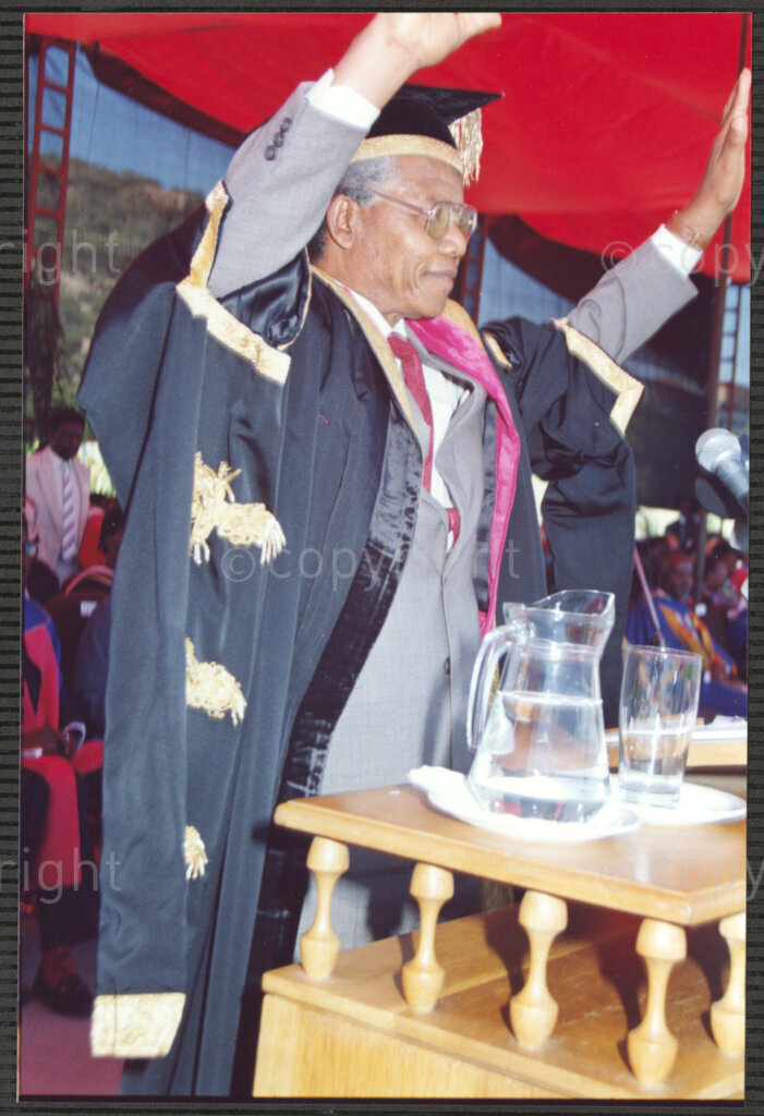 Turfloop Campus, University of the North, Mankweng, Northern Transvaal, South Africa, 19920425. PHOTO: ANC Archives.

Nelson Mandela, the president of the African National Congress (ANC), raises his hands to greet the audience on the occasion of his installation as chancellor of the University of the North, 25 April 1992, Turfloop Campus, University of the North (now the University of Limpopo), Mankweng, Northern Transvaal (now Limpopo), South Africa.