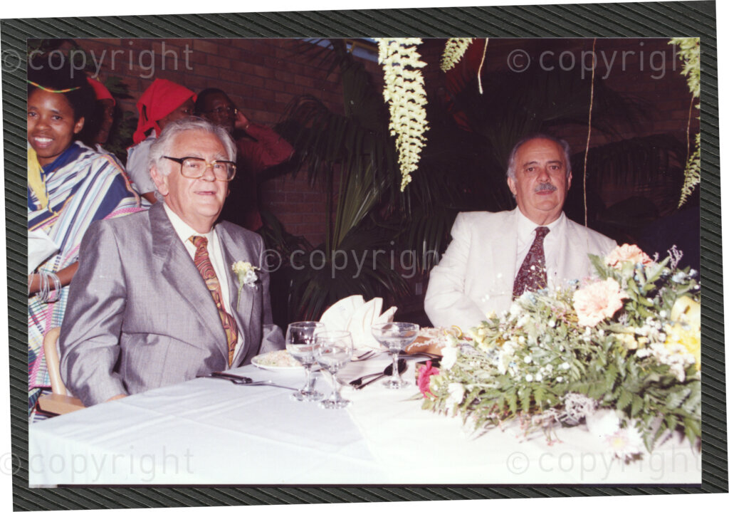 Turfloop Campus, University of the North, Mankweng, Northern Transvaal, South Africa, 19920425. PHOTO: ANC Archives.

Joe Slovo, chairman of the South African Communist Party (SACP) (left) and George Bizos (right) at a celebratory function after the installation of Nelson Mandela, the president of the African National Congress (ANC), as chancellor of the University of the North (now the University of Limpopo), 25 April 1992, Turfloop Campus, Mankweng, Northern Transvaal (now Limpopo), South Africa.