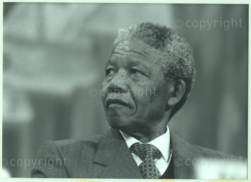 Geneva Ecumenical Centre, Geneva, Switzerland, 19900601. PHOTO: ANC Archives.

A photographic portrait of newly appointed Deputy President of the African National Congress (ANC) Nelson Mandela a few months after his release from prison, when he and his wife, Winnie Madikizela-Mandela pay an official visit to Switzerland, 4-9 June 1990. Shortly after his arrival in Geneva, he visits the staff and officials and representatives of the World Council of Churches (WCC) at the Geneva Ecumenical Centre.