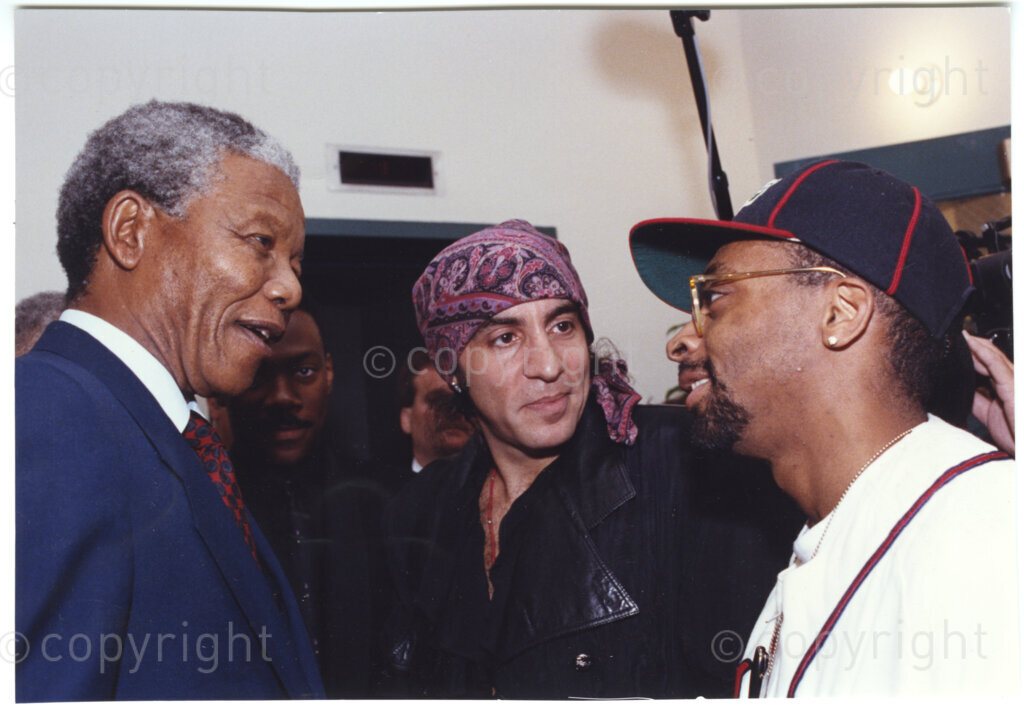 New York, New York State, United States of America, 19900601. PHOTO: ANC Archives.

In 1990, Nelson Mandela and his wife, Winnie Mandela, visit the city of New York from 20 to 23 June. This is the start of a 14-nations Freedom Tour, just 4 months after Mandela's release from jail. Mandela, (left), is seen here conversing with two unidentified New Yorkers who engage keenly with the world famous activist and Deputy President of the African National Congress.