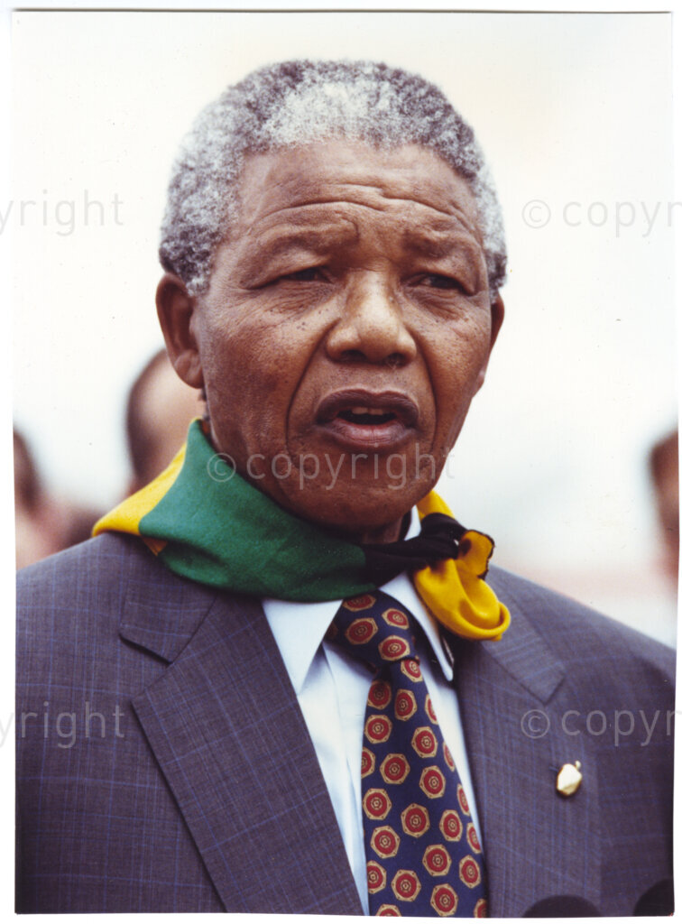 New York, New York State, United States of America 19900601. PHOTO: ANC Archives.

In 1990, Nelson Mandela and his wife, Winnie Mandela, visit the city of New York from 20 to 23 June. This is the start of a 14 nations tour, just 4 months after Mandela's release from jail. He has an African National Congress bandana around his neck and appears to be in pensive mood.