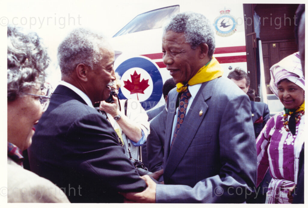 J F Kennedy International Airport, New York, New York, United States of America, 19900620. PHOTO: ANC Archives.

Nelson Mandela and his wife, Winnie, are on a 14-nation Freedom Tour in June 1990, just four months after Mandela's release from prison. In New York, Mayor David N. Dinkins, (centre), and his wife, Joyce, (left), are the Mandela's hosts. Dinkins greets Mandela, warmly, on his arrival at J F Kennedy International Airport. Dinkins is the first black mayor of New York City.