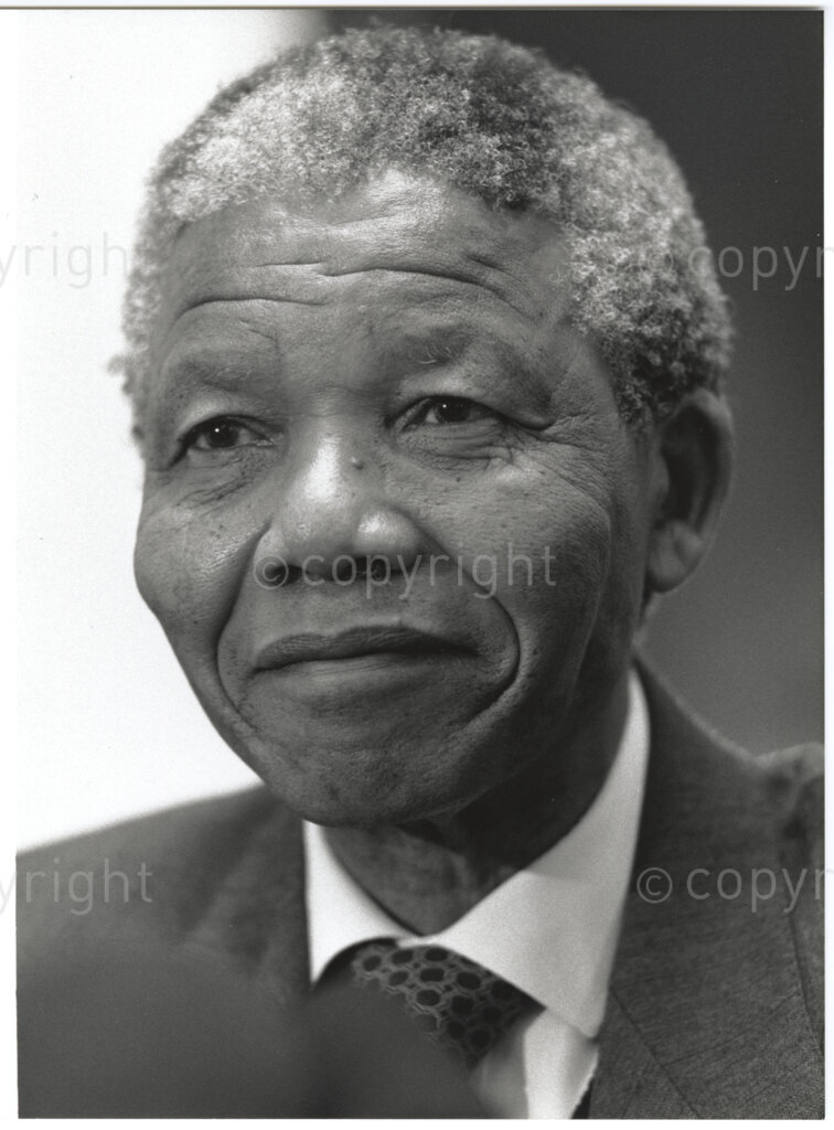 International Labour Organisation , Geneva, Switzerland, 19900608. PHOTO: ANC Archives.

A photographic portrait of the deputy president of the African National Congress (ANC) Nelson Mandela during his visit to Switzerland with his spouse Winnie Madikizela-Mandela from 4-9 June 1990 barely four months after his release from 27 years in prison. On 8 June 1990 he addresses the 77th Session of the International Labour Conference (ILC) at the International Labour Organisation (ILO) in Geneva where he expresses his gratitude for the support received from the ILO and urges the international community to persist in their demands that all political prisoners must be released, political trials ended, exiles returned, repressive legislation repealed, and the state of emergency ended in its entirety.