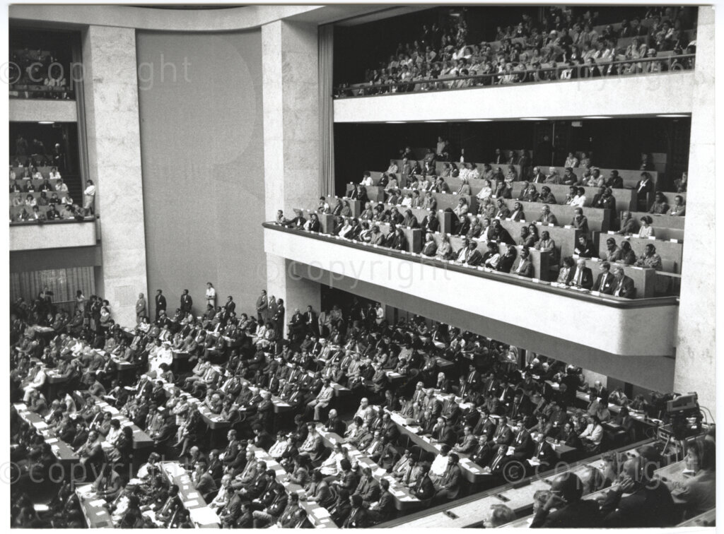 International Labour Organisation , Geneva, Switzerland, 19900608. PHOTO: ANC Archives.

The auditorium at the International Labour Organisation (ILO) in Geneva, 8 June 1990 is filled to capacity on the occasion of the 77th Session of the International Labour Conference (ILC) that played host to the deputy president of the African National Congress (ANC) Nelson Mandela. The ILO brings governments, employers and workers of approximately 187 member states together to set labour standards, develop policies and devise programmes promoting decent work for all women and men.