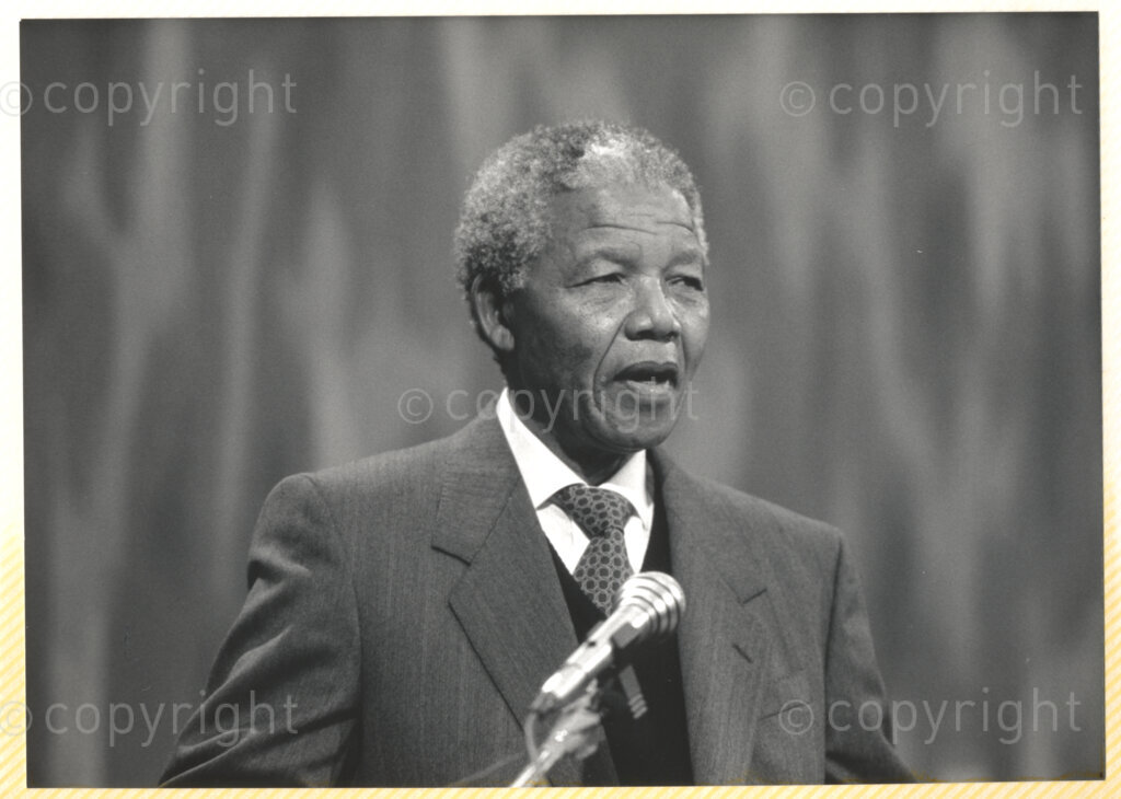 Geneva Ecumenical Centre, Geneva, Switzerland, 19900601. PHOTO: ANC Archives.

A photographic portrait of newly appointed Deputy President of the African National Congress (ANC) Nelson Mandela delivering a speech at the Geneva Ecumenical Centre, Switzerland barely a few months after his release from prison, when he and his wife, Winnie Madikizela-Mandela pay an official visit to Switzerland, 4-9 June 1990. Shortly after his arrival in Geneva, he visits the staff and officials and representatives of the World Council of Churches (WCC) at the Ecumenical Centre.