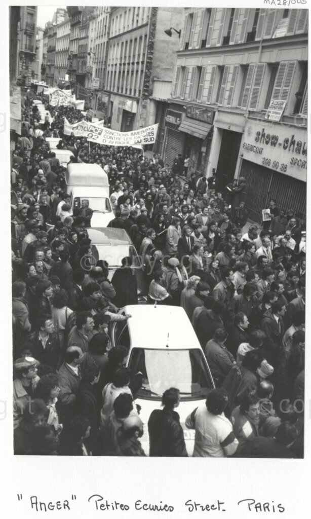 Arcueil, Val-de-Marne, Paris, Île-de-France, France, 19890101. PHOTO: ANC Archives: Anti-apartheid crowds demonstrate their anger in Rue des Petites-Ecuries in Arcueil, France c. 1989. Amongst the crowds are members of the Young Communist Movement of France (MJCF) (the 