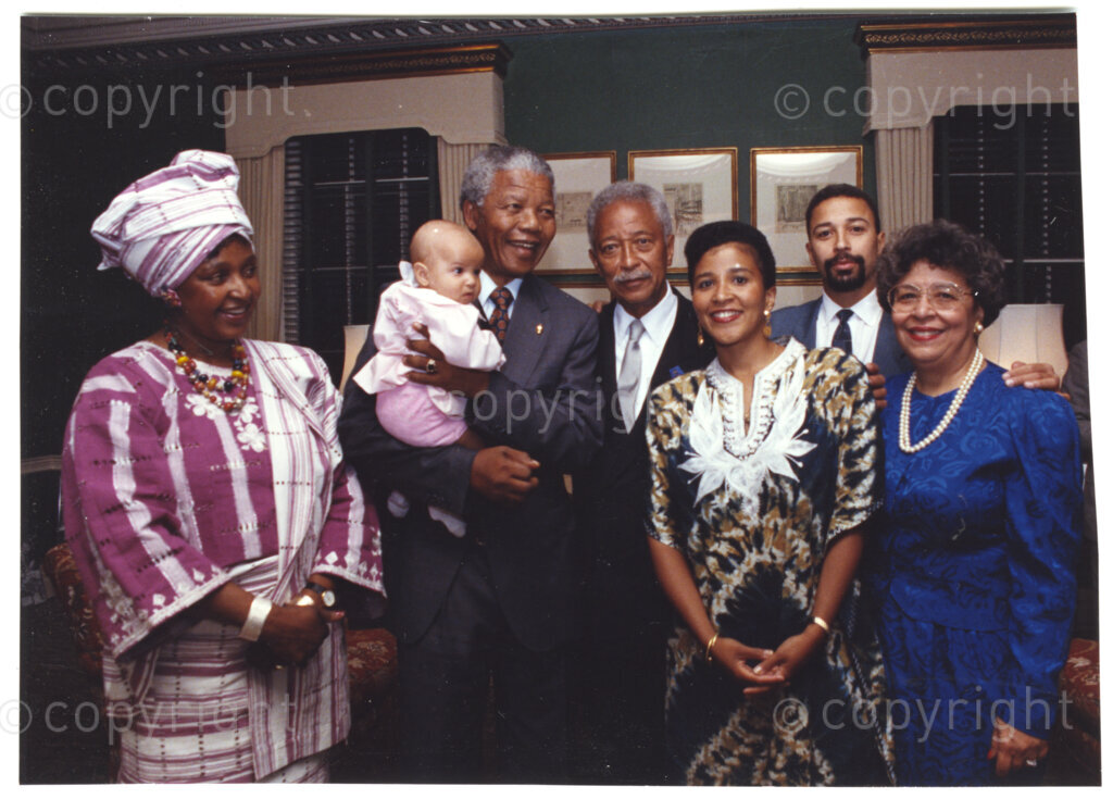 New York, New York State, United States of America, 19900601. PHOTO: ANC Archives.

In 1990, Nelson Mandela and his wife, Winnie Mandela, visit the city of New York from 20 to 23 June. This is the start of a 14-nations Freedom Tour, just 4 months after Mandela's release from jail. Mayor David Dinkins and his wife, Joyce, are the Mandela's hosts. The South African couple are seen in this Dinkins family photo. From left to right, Winnie, Mandela holding the grandchild, Mayor Dinkins, his daughter, her husband and Mrs Dinkins.