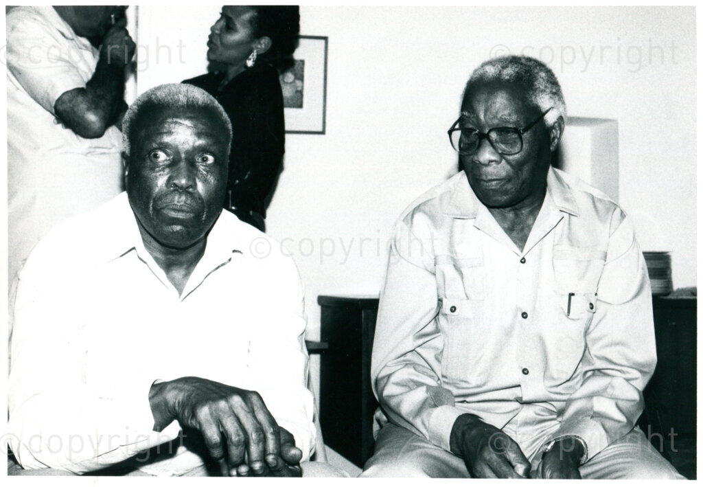 Govan Mbeki (right) and Raymond Mhlaba (left) visiting Mazimbu, Tanzania in February 1990. Photo: Eli Weinberg Photo Lab.