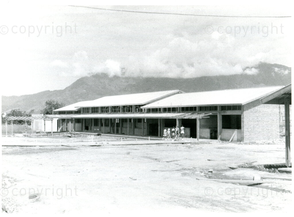 The new dining hall of Unit 1 (opened 16 June 1981) nearing completion in Mazimbu, Tanzania, May 1981. Photographer: Willem van Harderwijk.