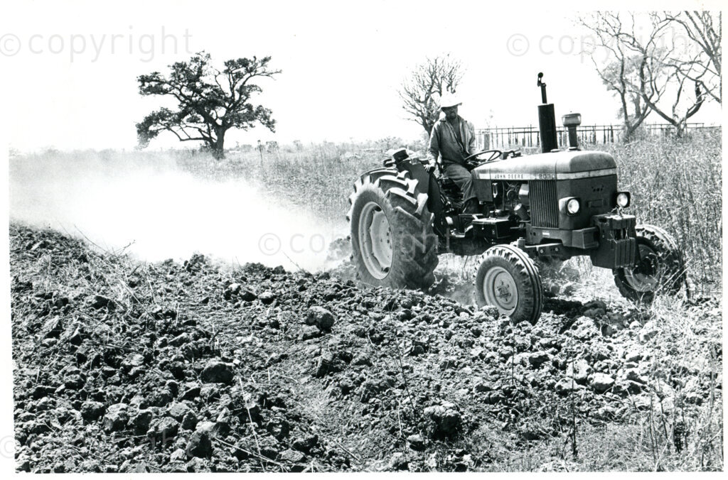 One of the few tractors available to plough the fields of the farm in Mazimbu, Tanzania, approx. 1980. Photo: Eli Weinberg Photo Lab.