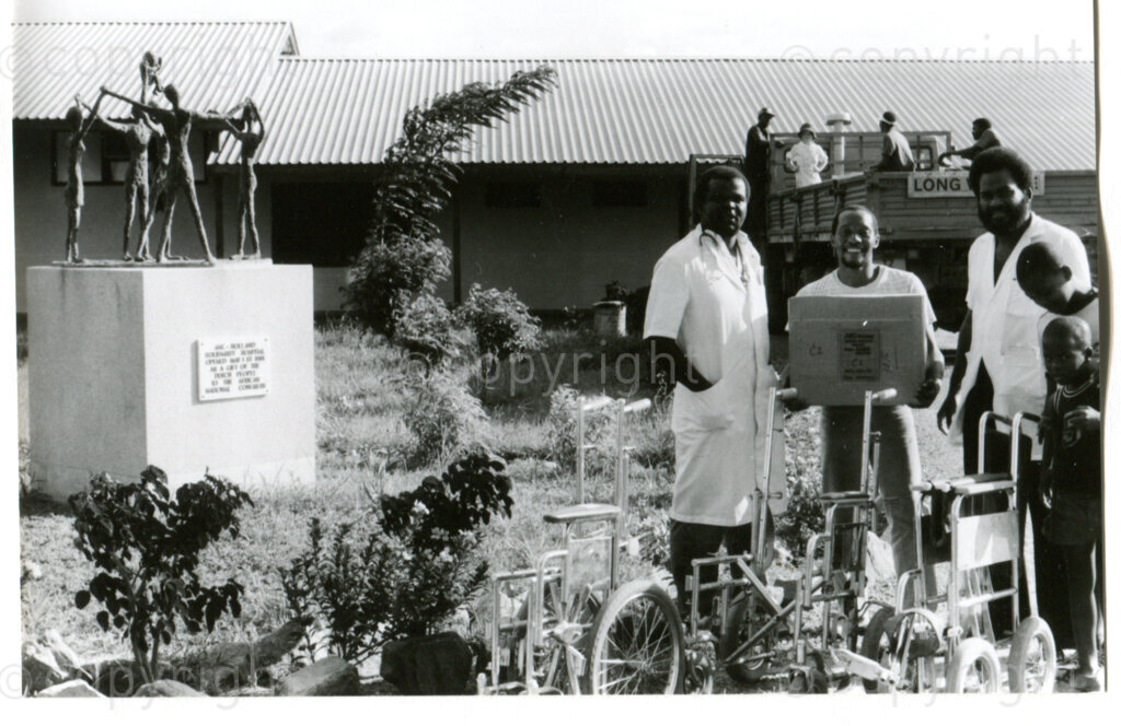 The ANC Holland Solidarity Hospital in Mazimbu, Tanzania, Spring 1988; left: sculpture by Dutch artist Truus Menger; right: ANC personnel with medical solidarity goods from The Netherlands. Photo: Eli Weinberg Photo Lab.