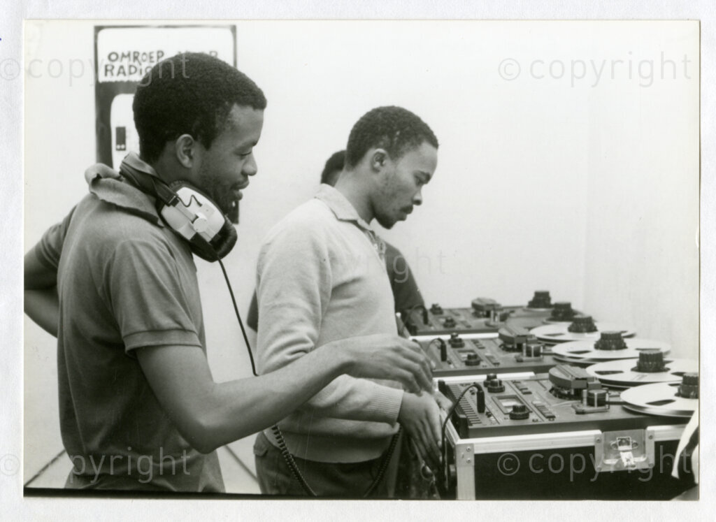Radio Freedom workers Joe, Elias and Zanelle being trained in the use of the fourth set of studio equipment from the Dutch 
