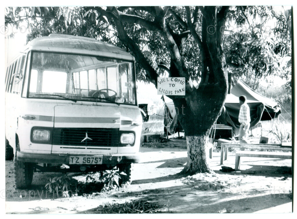 Passenger bus donated by a solidarity organization in the Lillies Park section of the ANC Development Centre Dakawa, Tanzania, April 1987. Photographer: Maud Kortbeek.