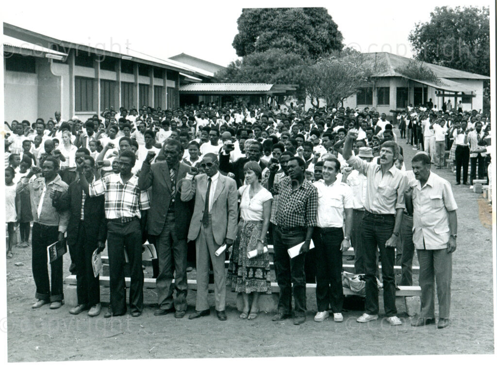 Official opening of SOMAFCO, 21-23 August 1985; part of the Mazimbu community during one of the sessions; front row, from right: Oswald Dennis, Willem van Harderwijk, Spencer Hodges; Mazimbu, Tanzania, August 1985. Photo: Eli Weinberg Photo Lab.