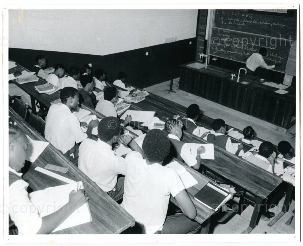 SOMAFCO students in the chemistry classroom annex laboratory theatre; Mazimbu, Tanzania, 1987. Photo: Eli Weinberg Photo Lab.