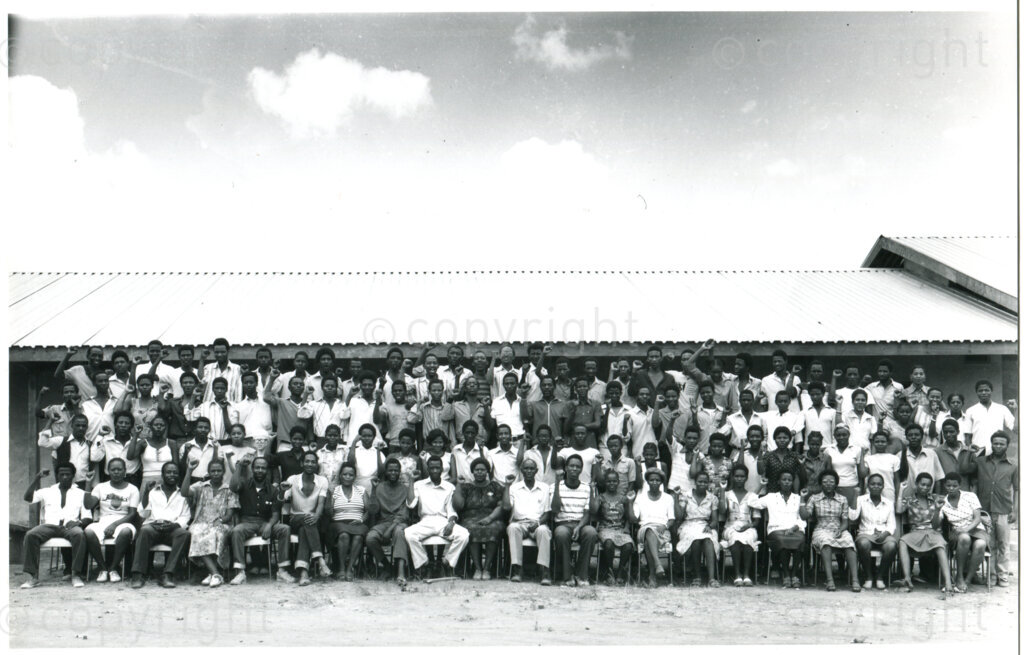 Group portrait of students and staff of the Solomon Mahlangu Freedom College (SOMAFCO), Mazimbu, Tanzania, 1980. Photo: Eli Weinberg Photo Lab.