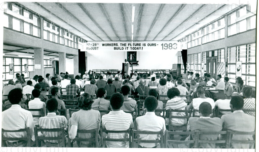 Meeting of the 1st Workers Council of the ANC at SOMAFCO in the J.B. Marks Hall, Mazimbu, Tanzania, August 1983. Photo: Eli Weinberg Photo Lab.