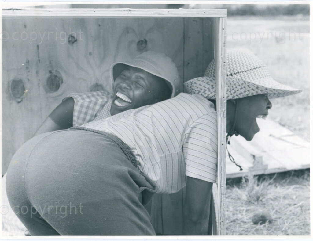 SOMAFCO youth assist in the construction of a play house for the nursery school in Mazimbu, Tanzania, September 1984. Photo: Eli Weinberg Photo Lab.