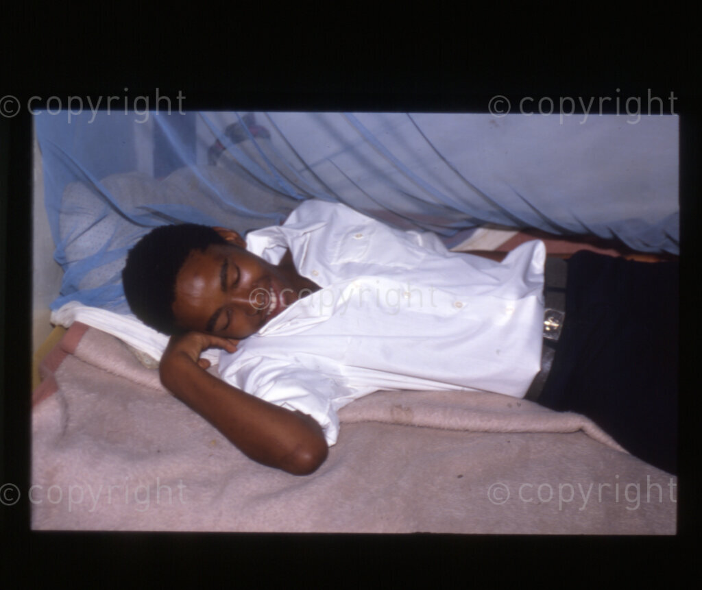 SOMAFCO-students in dormitory  studying and sleeping, Mazimbu (SOMAFCO), Tanzania, 1990