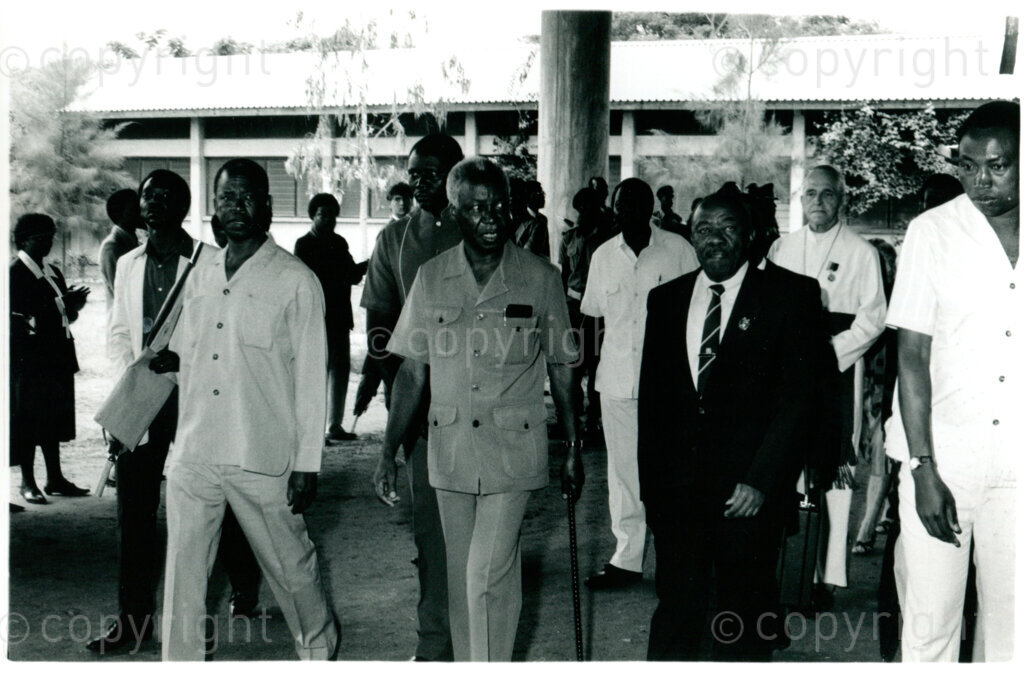 Celebration of the 10th anniversary of SOMAFCO in Mazimbu, Tanzania, August 1989: officials Alfred Nzo (ANC; front row, centre-right) and Julius Nyerere (former president of Tanzania; front row, centre). Photo: Eli Weinberg Photo Lab.