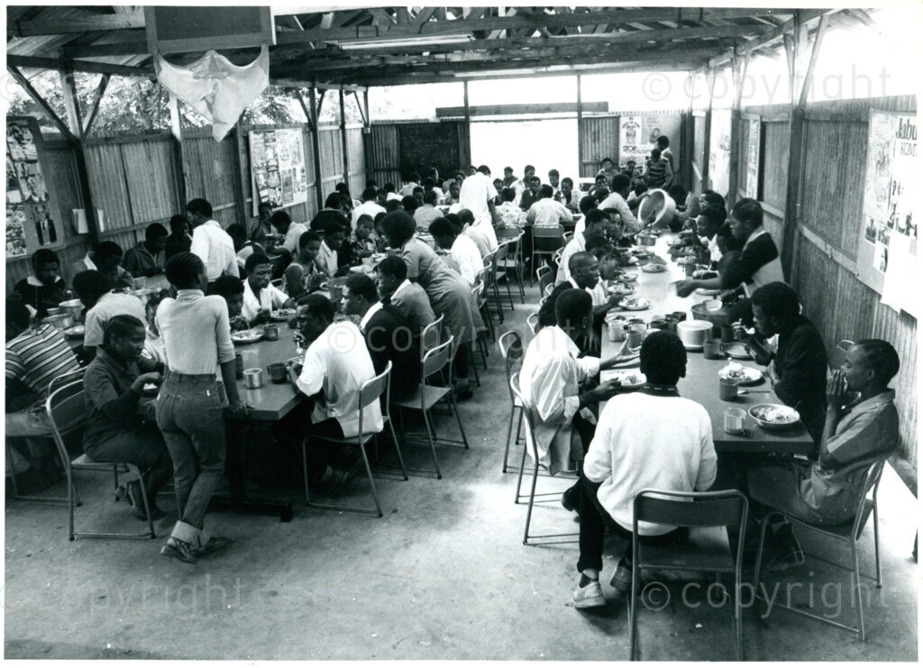 The Hector Peterson Hall  student dining hall in the early years of Mazimbu, Tanzania, approx. 1980. Photographer: Eli Weinberg.