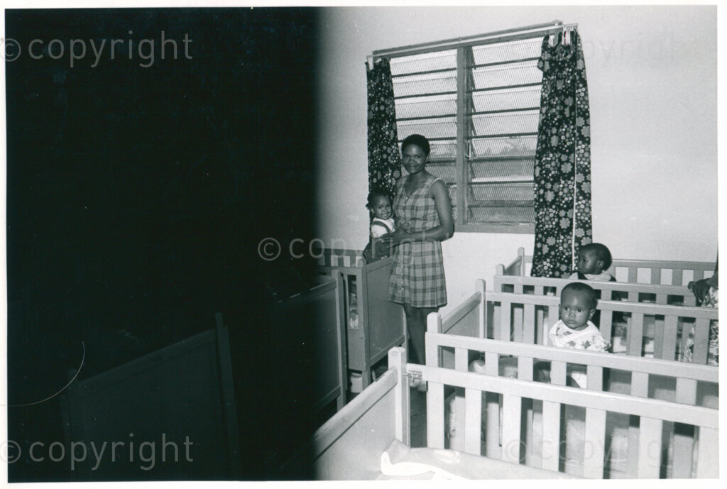 The day care centre of the ANC in Morogoro, Tanzania in 1977: group of children with their mothers/caregivers. Photographer unknown.