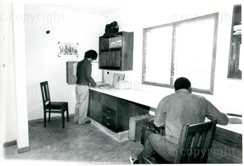 Students being trained in photography at the Eli Weinberg Photo laboratory in Mazimbu, Tanzania, October 1983; left: Maurice; right: Thami. Photo: Eli Weinberg Photo Lab.
