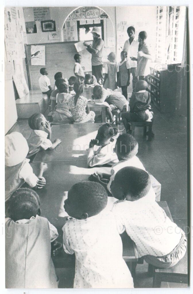 SOMAFCO Primary School: children and staff; Mazimbu, Tanzania, 1981. Photo: Eli Weinberg Photo Lab.