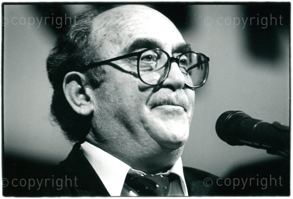 Dennis Goldberg reading a message from Nelson Mandela at the concluding rally of the Dutch AAM in Amsterdam, 15 October 1994. Photographer: Pieter Boersma.