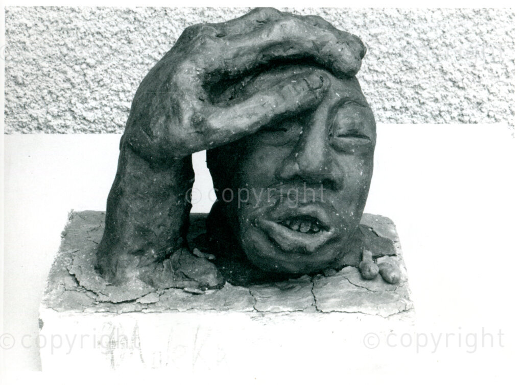 The fine arts workshop of the ANC Dept of Arts and Culture in Mazimbu, Tanzania, April 1987: clay sculpture by Bruce Maleka (apartheid victim comforted by the ANC). Photo: Eli Weinberg Photo Lab (Pro).