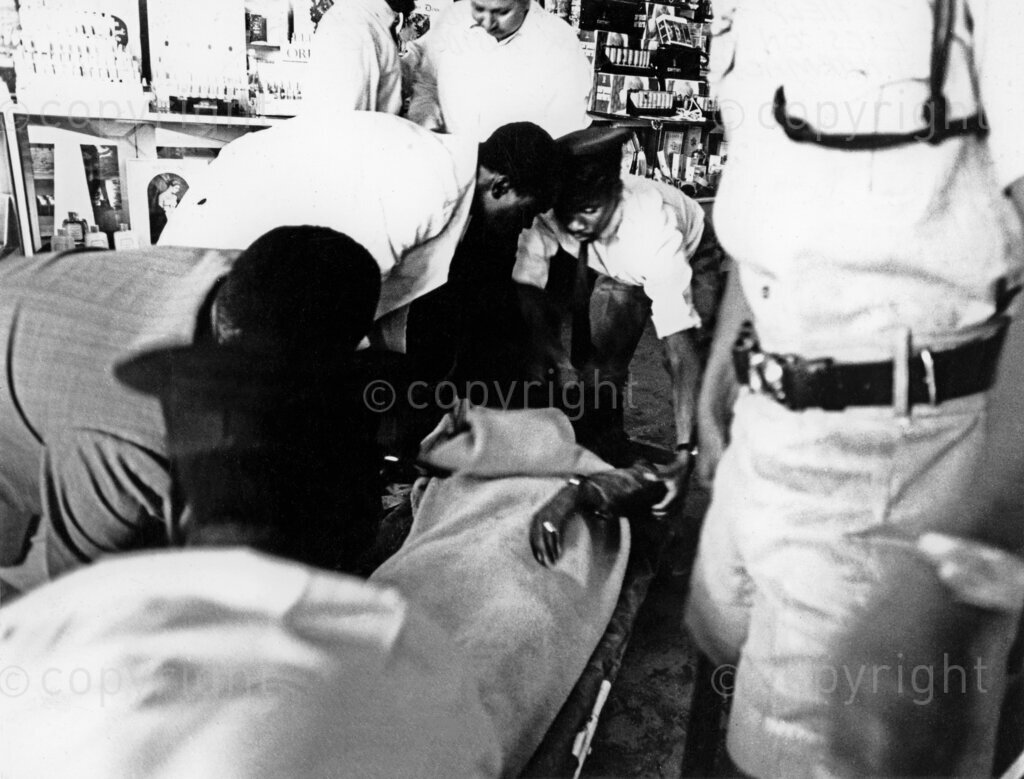 July 5, 1969, Tom Mboya was shot and killed at a pharmacy along as Government Road (now Moi Avenue) in Nairobi. He had just purchased medicine, when an assassin approached him and fired two shots at close range, fatally wounding him. Photojournalist Mohamed Amin was at the scene within minutes. These are some never seen before images of that tragedy.