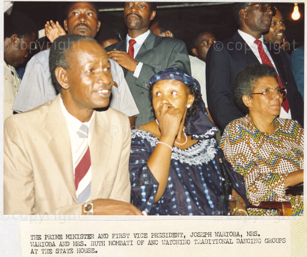 Dar Es Salaam, Tanzania. PHOTO: ANC Archives. 6 March 1990. The Prime Minister and first Deputy President of Tanzania, Joseph Warioba, Mrs. Warioba and Ruth Mombati of the African National Congress (ANC), watch traditional dancing which has been arranged to welcome Nelson and Winnie Mandela to the State House in Dar Es Salaam, Tanzania. The Mandelas are on a tour of African states which support the liberation struggle in South Africa. It is just one month since Mandela was freed from prison.