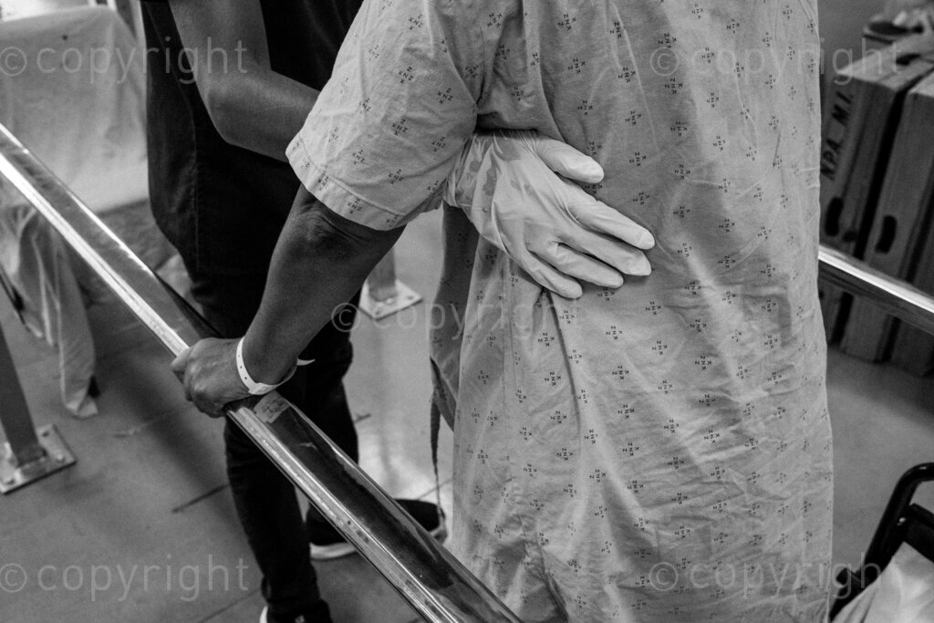 The hands of a physiotherapist guide and support a patient as she moves forward in her journey to regained independence. 22, 23, Feb. 2024, Pietermaritzburg, KwaZulu Natal, South Africa.