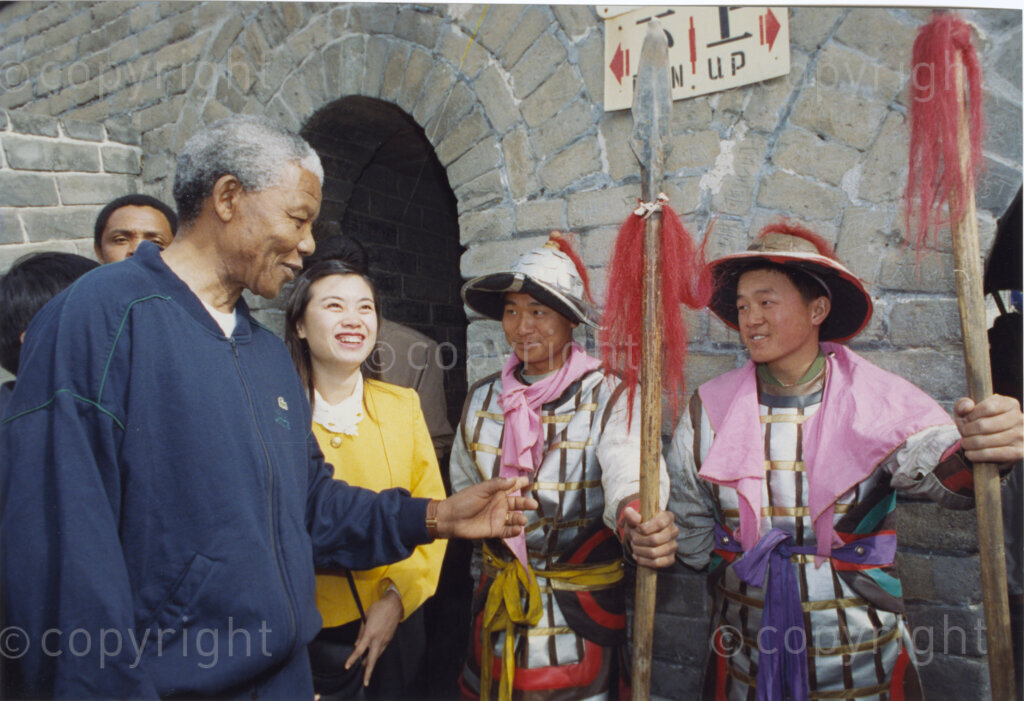 Great Wall of China, Beijing, Beijing Municipality, People's Republic of China , 19921007. PHOTO: ANC Archives.

The President of the African National Congress, Nelson Mandela, accompanied by the ANC spokesman, Mr Pallo Jordan, visits the People's Republic of China (PRC) in October 1992. The weeklong visit to China involves discussions towards establishing official ties between a Greater China (including PRC and the Republic of China) and South Africa. A number of welcoming ceremonies are held where the ANC delegates meet with, amongst others, President Yang Shangkun, Prime Minister Li Peng and the Chinese Communist Party General Secretary, Jiang Zemin. The trip includes a visit to the Great Wall of China as seen here.
