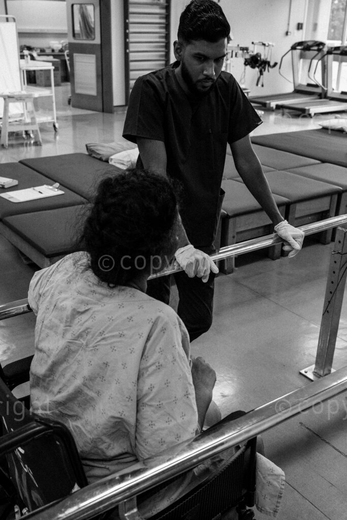 A physiotherapist discusses the healing prognosis with a patient. 22, 23, Feb. 2024, Pietermaritzburg, KwaZulu Natal, South Africa.