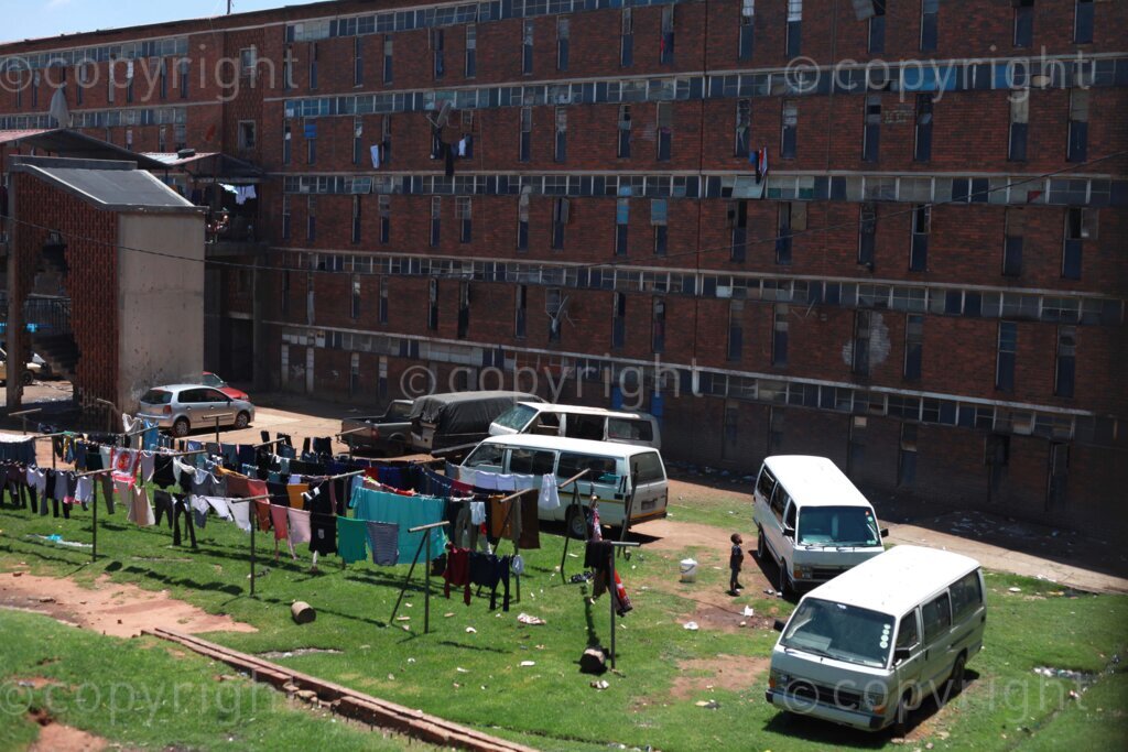The outside space of the Madala hostel in Alexandra, Johannesburg in Gauteng, South Africa on late Sunday morning on 04 Dec 2022 Photo: Oupa Nkosi 