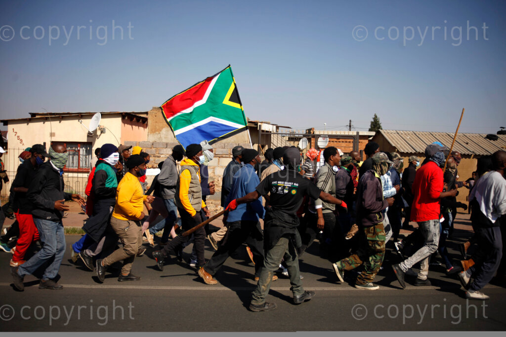 The community of Diepkloof in Soweto embarked on an operation dudula during the Youth Day holiday to warn the illegal foreign nationals living in Soweto, south west of Johannesburg in Gauteng, South Africa to vacate the premises and visited houses that are alleged to be selling drugs. The peaceful confrontations took place with the involvement of police that were overseeing the entire process.  16/06/21 Photo: Oupa Nkosi